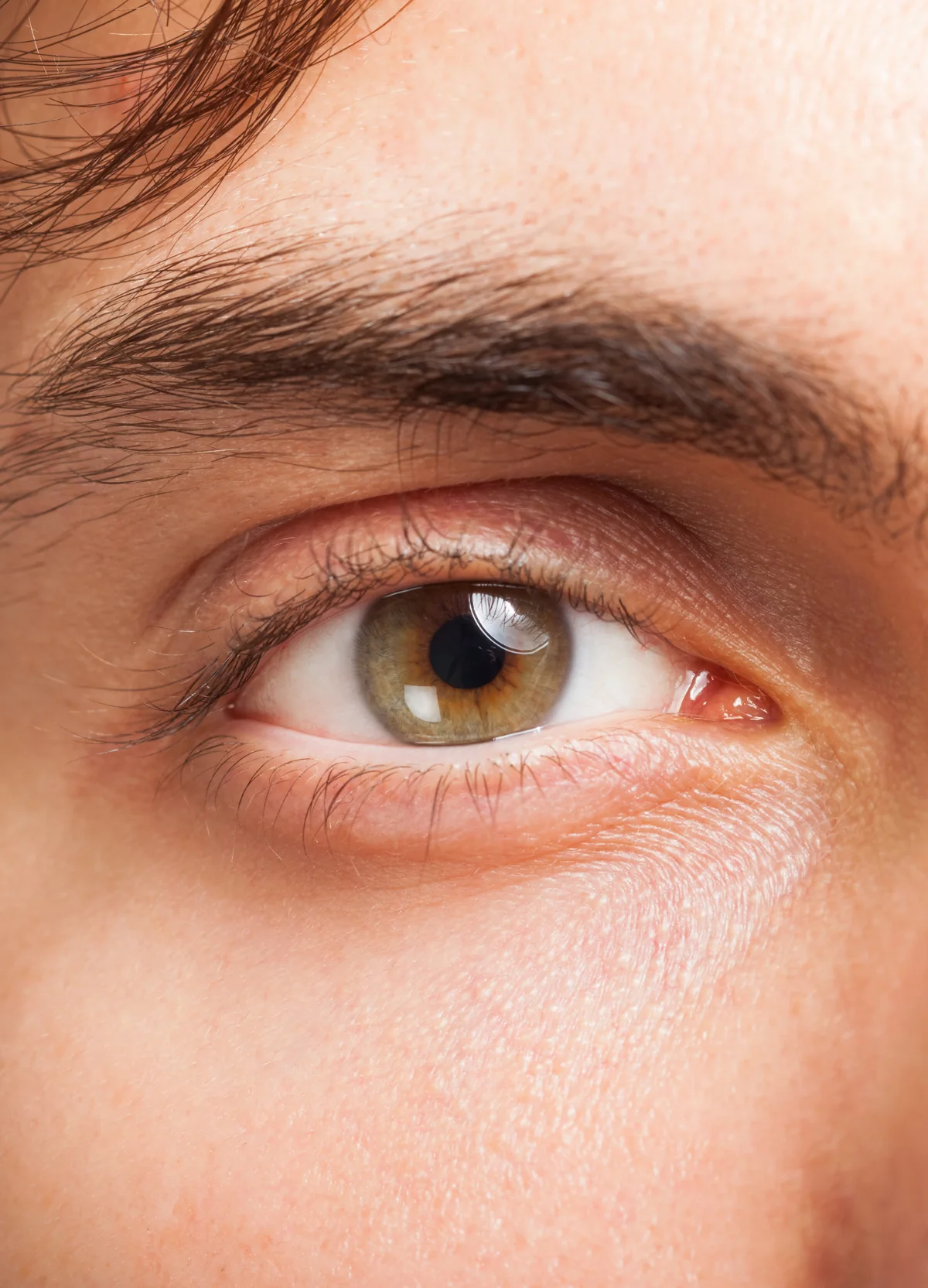 Close view of a man’s eye area