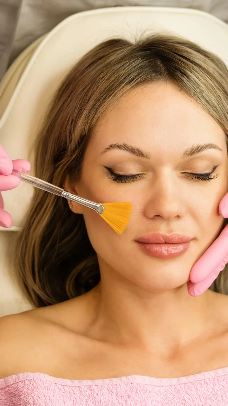 Chemical peel solution applied with a brush during a medical grade peel at Advanced Aesthetics
