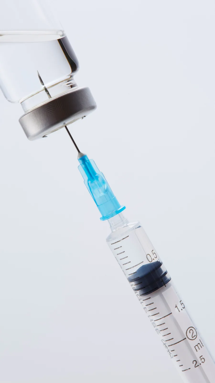 Vitamin injection syringe and vial at Advanced Aesthetics