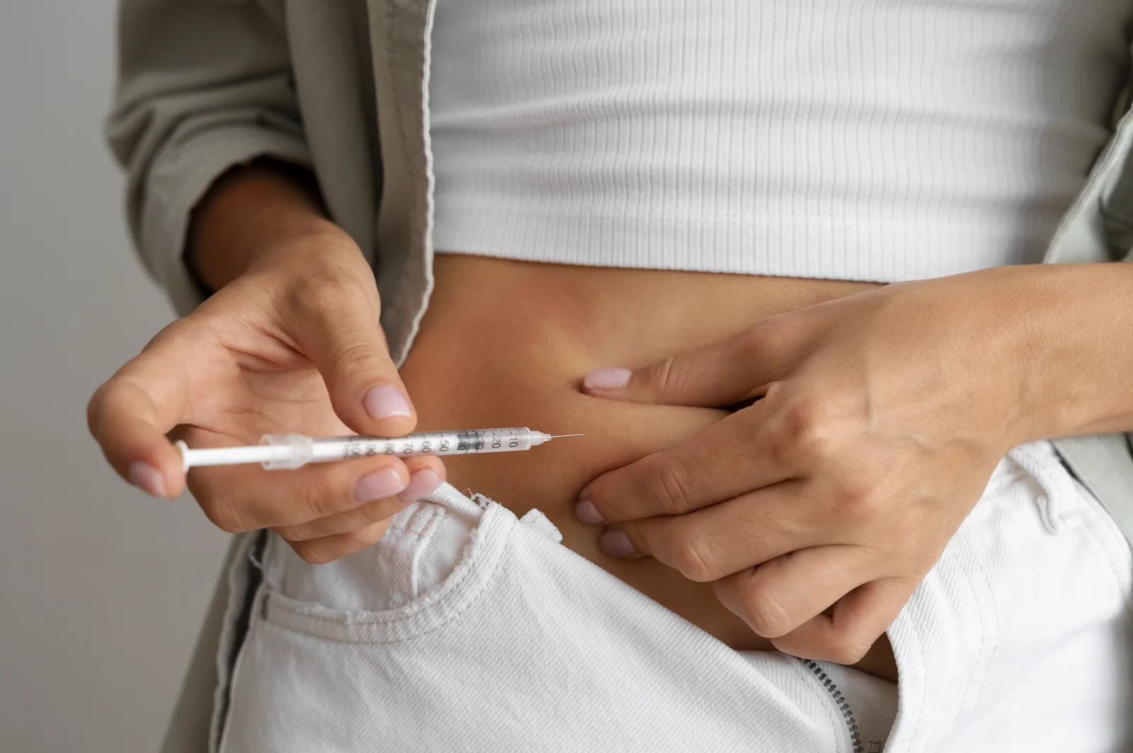 Weekly weight loss injection in the abdomen